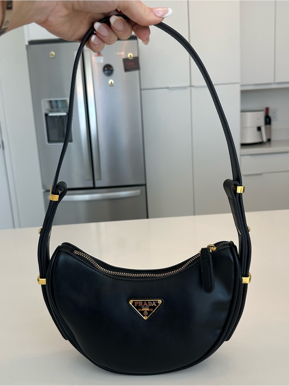 Black Leather Crescent Shoulder Bag with Gold Hardware